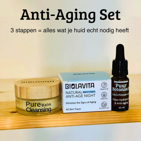 Anti-aging skincare set with products on a wooden surface